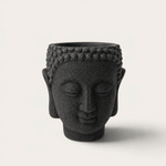 Vela escultórica THE IBIZA CANDLES con forma de cabeza de Buda en color negro brillante y acabado artesanal