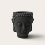 Vela escultórica THE IBIZA CANDLES con forma de cabeza de Buda en color negro brillante y acabado artesanal