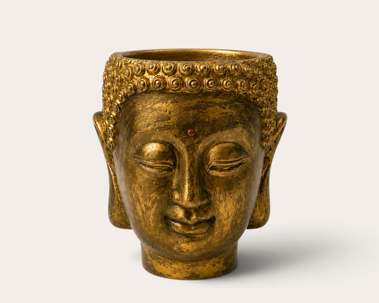 Vela escultórica THE IBIZA CANDLES Golden Bronze con forma de cabeza de Buda pintada a mano en acabado dorado envejecido
