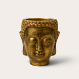 Vela escultórica THE IBIZA CANDLES Golden Bronze con forma de cabeza de Buda pintada a mano en acabado dorado envejecido