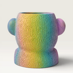 Vela escultórica Rainbow de THE IBIZA CANDLES pintada a mano con textura rugosa y degradado de colores vibrantes